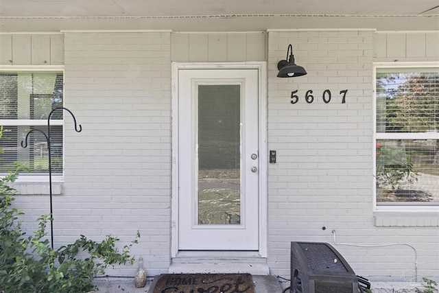 5607 Fairview Dr, Pensacola, FL 32505 - doorway to property with brick siding