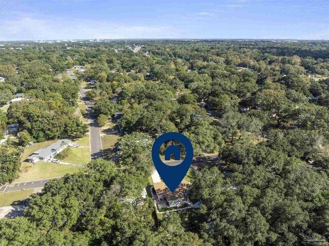 5607 Fairview Dr, Pensacola, FL 32505 - aerial view of property and surrounding area with a heavily wooded area