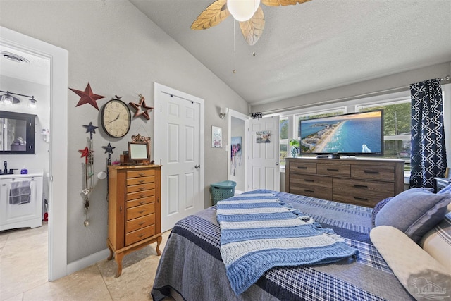5607 Fairview Dr, Pensacola, FL 32505 - bedroom featuring vaulted ceiling, baseboards, a ceiling fan, and a textured ceiling