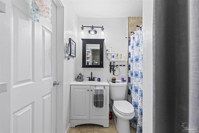 5607 Fairview Dr, Pensacola, FL 32505 - full bathroom with vanity, toilet, a textured wall, and a shower with curtain