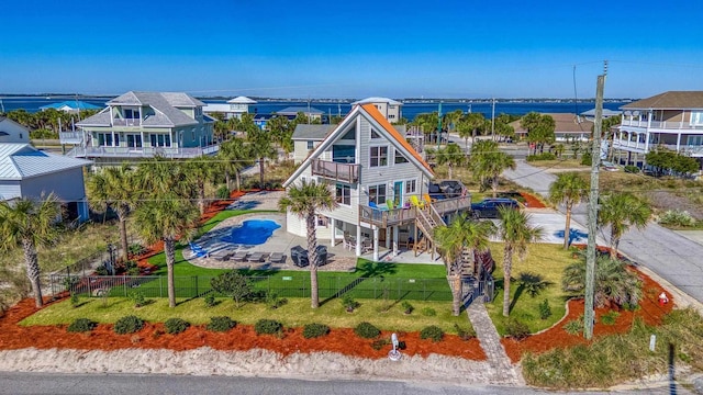 birds eye view of property featuring a water view