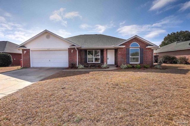 single story home with a garage