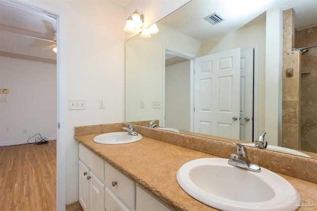 bathroom featuring vanity and hardwood / wood-style flooring