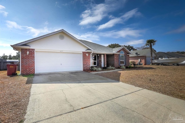 ranch-style house featuring a garage