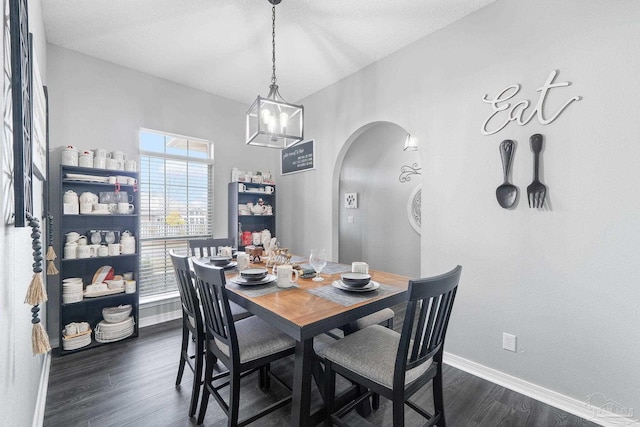 dining area featuring dark hardwood / wood-style flooring