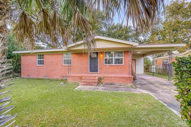 view of front facade featuring a carport and a front lawn