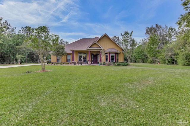 view of front facade featuring a front lawn and covered porch