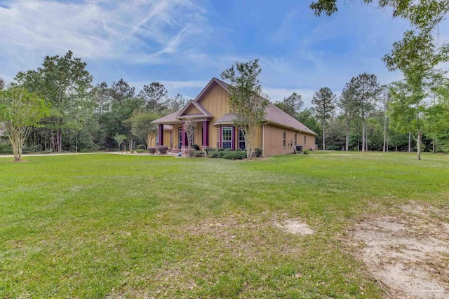 view of front of home with a front yard