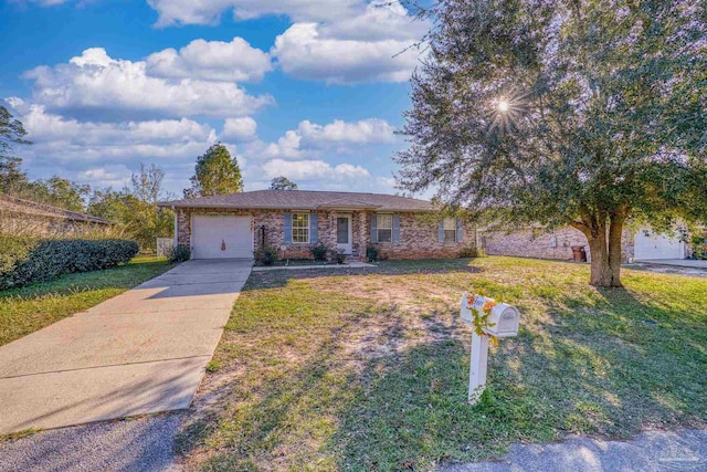 single story home with a garage and a front lawn