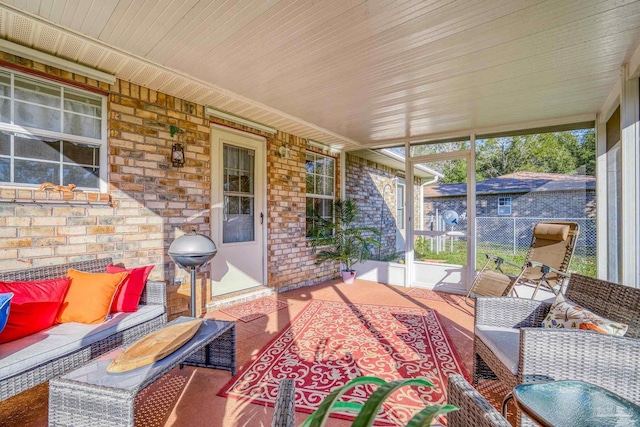 sunroom / solarium featuring a wealth of natural light