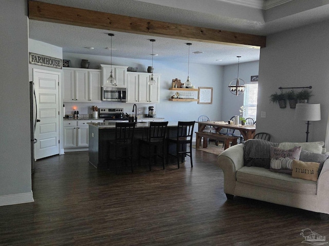 interior space featuring beamed ceiling, baseboards, dark wood-style floors, and a chandelier