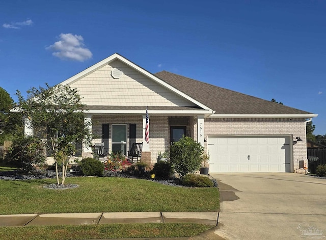 craftsman inspired home with a front yard, brick siding, concrete driveway, and an attached garage