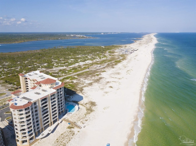 bird's eye view with a water view and a view of the beach