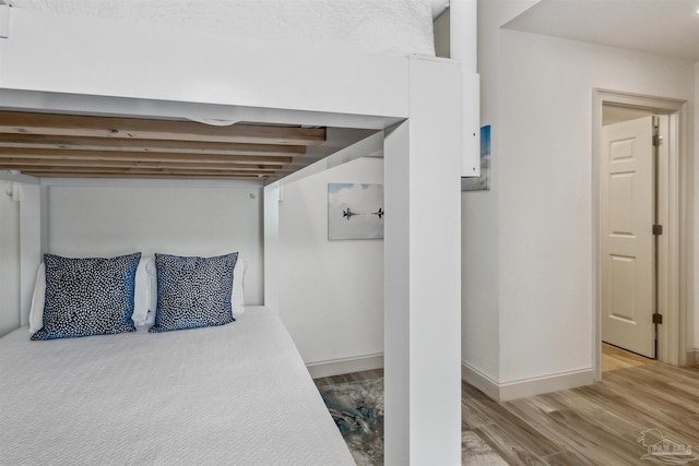 bedroom with light wood-type flooring