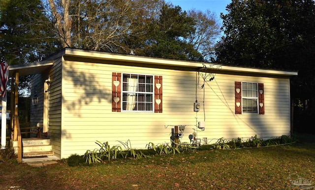 exterior space featuring a yard