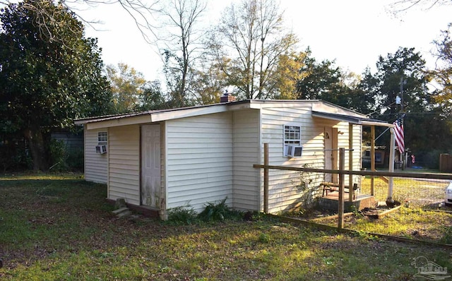 view of outdoor structure with a yard