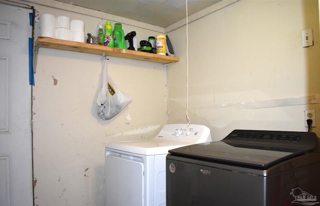 laundry room with independent washer and dryer