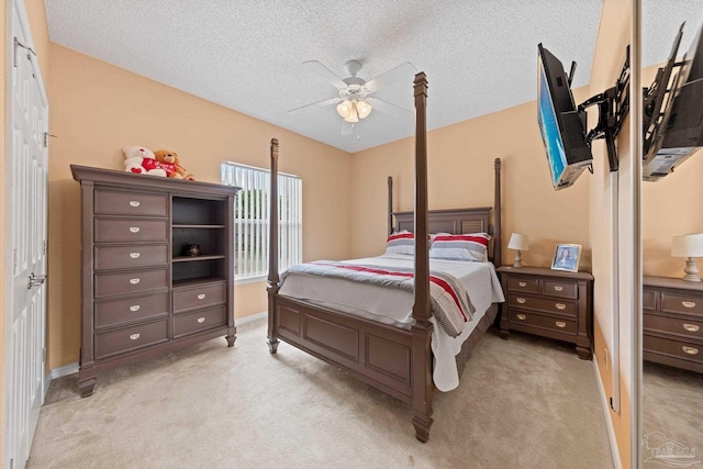 10108 Castleberry Blvd, Pensacola, FL 32526 - bedroom featuring light carpet, a textured ceiling, and ceiling fan