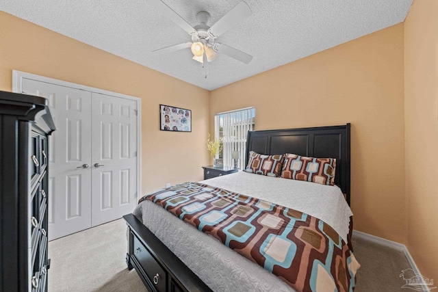 10108 Castleberry Blvd, Pensacola, FL 32526 - bedroom with light colored carpet, a closet, a ceiling fan, and a textured ceiling