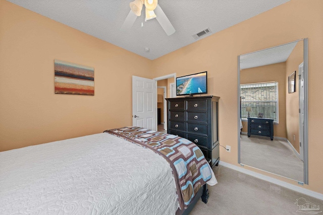 10108 Castleberry Blvd, Pensacola, FL 32526 - bedroom featuring light carpet, a ceiling fan, and a textured ceiling