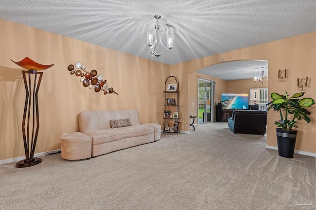 10108 Castleberry Blvd, Pensacola, FL 32526 - living area featuring a chandelier, carpet floors, and arched walkways