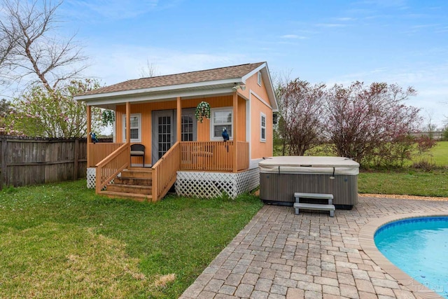 10108 Castleberry Blvd, Pensacola, FL 32526 - back of property with a hot tub, an outdoor pool, roof with shingles, a porch, and a patio area