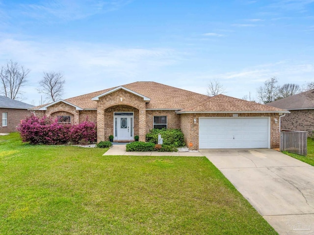 10108 Castleberry Blvd, Pensacola, FL 32526 - ranch-style home with brick siding, an attached garage, a front yard, driveway, and a shingled roof