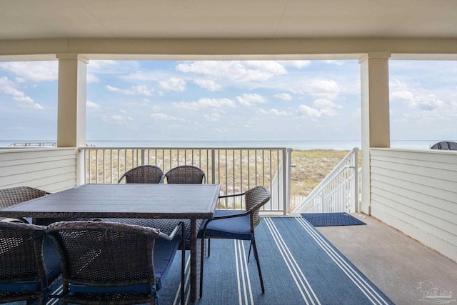 deck featuring a water view