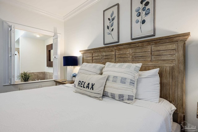 bedroom featuring ornamental molding