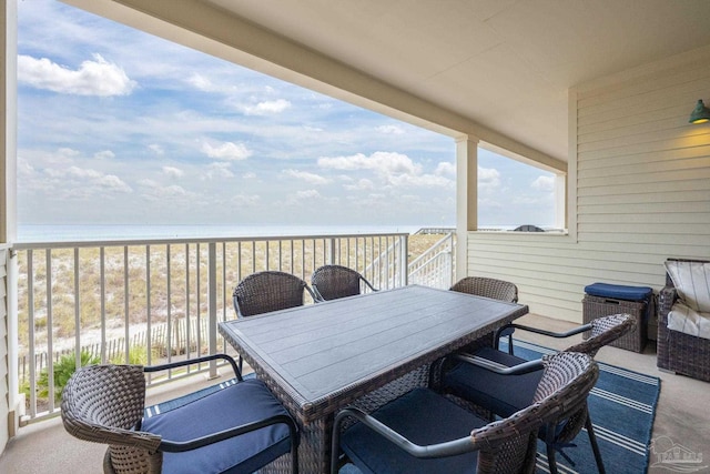 balcony featuring a water view