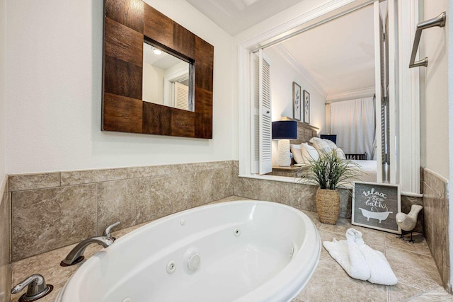 bathroom featuring crown molding and tiled bath