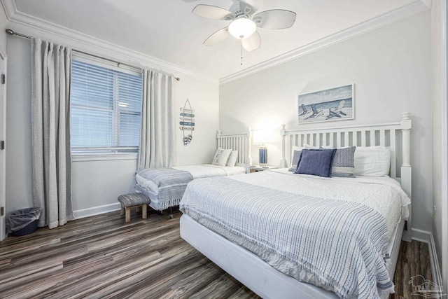 bedroom with crown molding, ceiling fan, and dark wood-type flooring