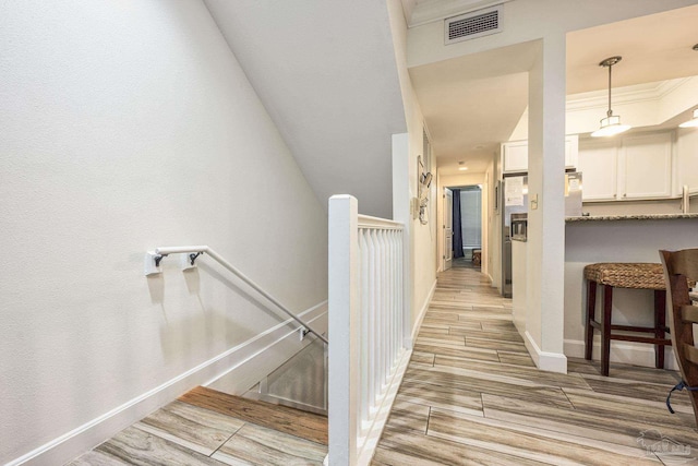 corridor featuring light wood-type flooring