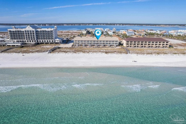 bird's eye view with a view of the beach and a water view