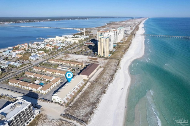 aerial view featuring a water view and a view of the beach