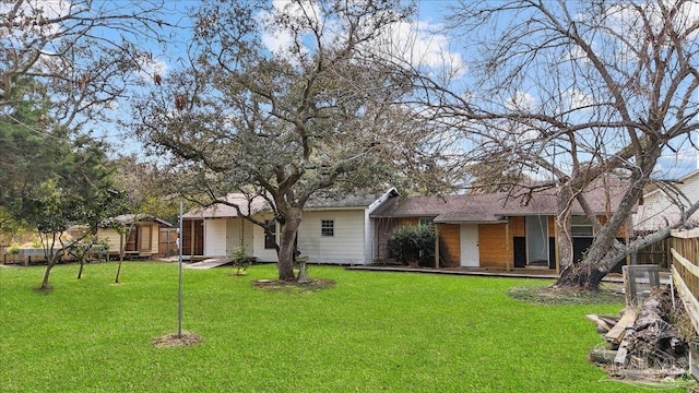 exterior space with a front lawn