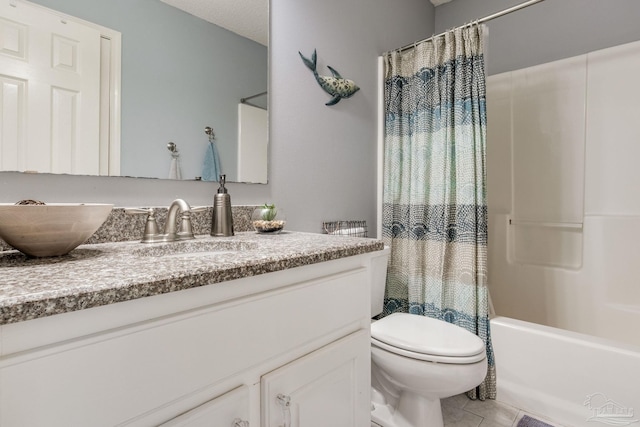 bathroom featuring tile patterned flooring, vanity, toilet, and shower / bathtub combination with curtain