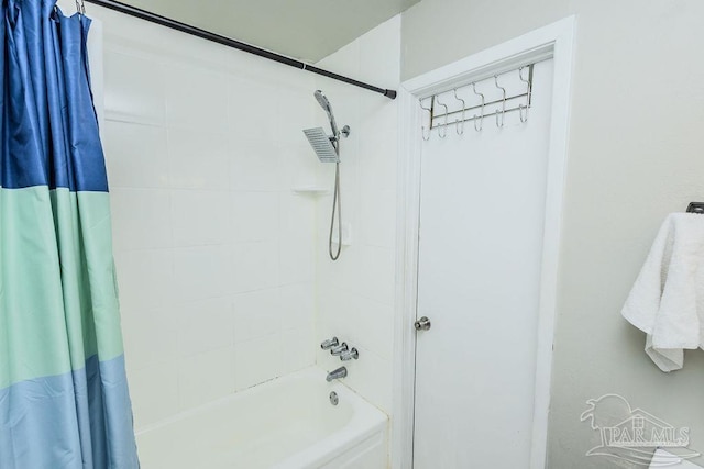 full bathroom featuring shower / bathtub combination with curtain