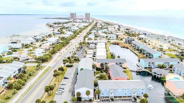 aerial view featuring a water view and a residential view