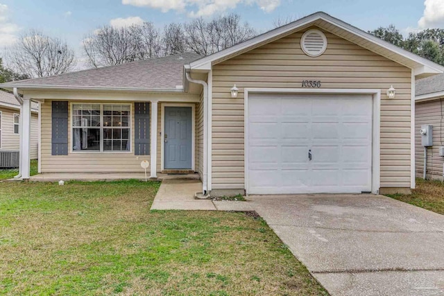 single story home with a garage and a front yard