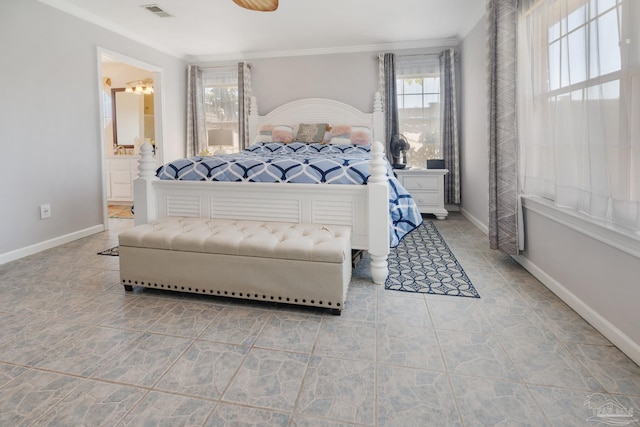 bedroom with connected bathroom and ornamental molding