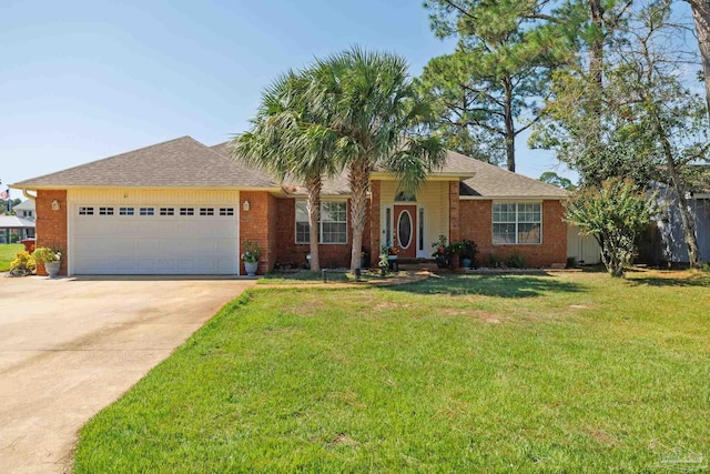 ranch-style home with a front lawn and a garage