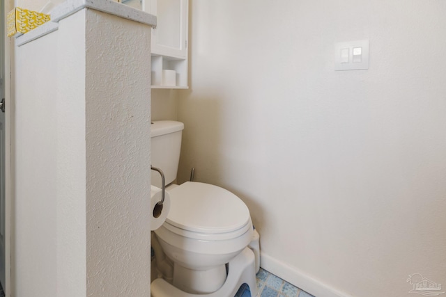 bathroom featuring toilet