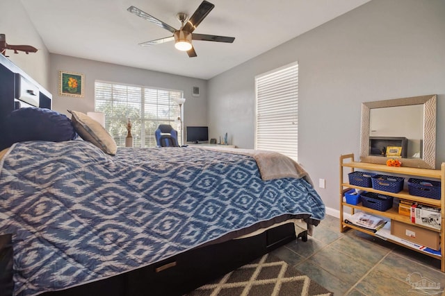 bedroom featuring ceiling fan