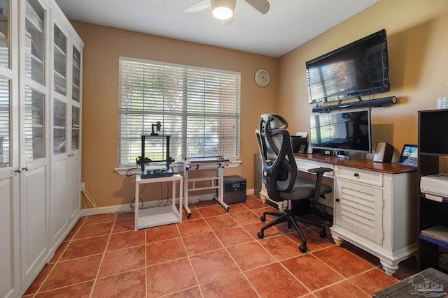 tiled office with a wealth of natural light and ceiling fan