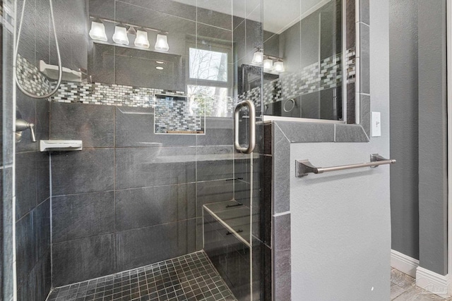 bathroom featuring an enclosed shower