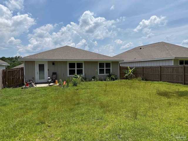 3464 Fallschase Blvd, Pensacola, FL 32526 - rear view of property featuring a fenced backyard and board and batten siding