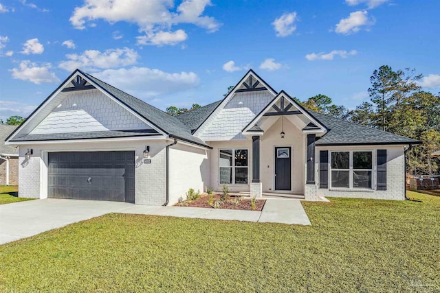 6563 Gentle Rain Dr, Milton, FL 32570 - view of front of house with a front lawn, an attached garage, driveway, and brick siding
