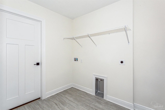 6563 Gentle Rain Dr, Milton, FL 32570 - laundry room featuring washer hookup, baseboards, and hookup for an electric dryer
