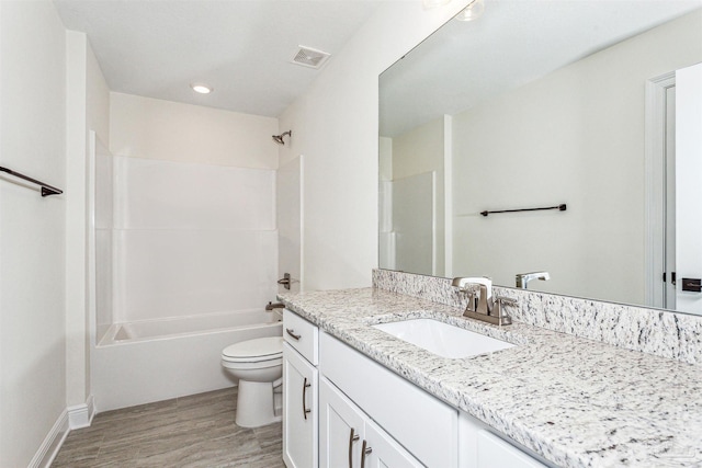 6563 Gentle Rain Dr, Milton, FL 32570 - full bath with wood finished floors, vanity, toilet, tub / shower combination, and recessed lighting